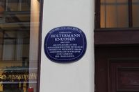 3. Øvre Slottsgate 6 Dammgården blå plakett.JPG