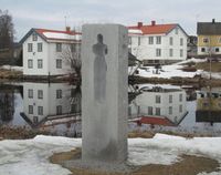 Minnesmerket i Eidsvoll kommune er reist nær Andelva, ved Eidsvollsbygningen. Foto: Stig Rune Pedersen (2013). .