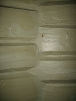 Konstruksjonsdetalj, samanføyinga av laftestokkar i eit hjørne. Foto: Olve Utne (2009).