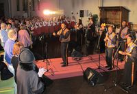I desember 2011 sto Bærum Pikekor på scenen i Helgerud kirke med det berømte amerikanske gospelkoret Angels in Harlem Gospel Choir. Foto: Svend Aage Madsen