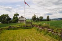 Ruinen av Gudleiv Asakar Kirkja sett mot vest ved inngangen. Foto: Nils Sundstu (2012).