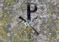 Symbolet chi rho på gravminne på Vår Frelsers gravlund i Oslo.