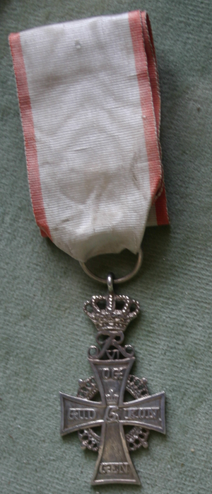 Dannebrogsmennenes hederstegn.png