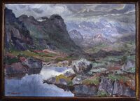 Landskap med fjell og vann