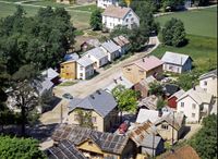 Folkestadgata i Folkestadbyen. Flyfoto frå 1961. Foto: Widerøes Flyveselskap.