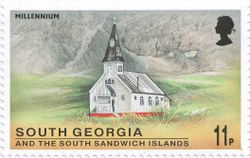 Frimerke med hvalfangerkirken på South Georgia, 11P. Tusenårsutgivelse (Millennium) 1999.