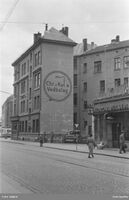 Reklame for bedriften på gavlsvegg mot Frognerveien på bygningen i Bygdøy allé 1 hvor de hadde hovedkontor fra 1920. Foto: Oslo byarkiv