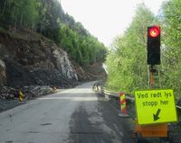 Vegarbeid i Skreiberga, nord for kommunegrensa mot Eidsvoll. I 2014 åpna en ny tunnel samt en dagstrekning her. Foto: Stig Rune Pedersen