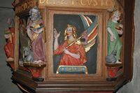 En framstilling av erkeengelen Gabriel på prekestolen, utført sannsynligvis av Johan Bithugger i 1646. Foto: Arnstein Rønning (2007).