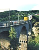 Gamle Svinesundsbru fotografert fra svensk side i 1999. Foto: Stig Rune Pedersen (1999).