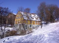 Nedre Papirmølle/Glads Mølle ved Akerselva. Fredet bygning.
