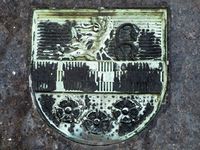 Skjoldet i slektsvåpenet Gude, Vår Frelsers gravlund i Oslo.