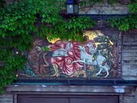 Per Viglands frise over døren på kapellet på Os gravlund i Halden. Foto: Siri Johannessen