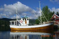 «Hellarnes» ved kai. Duken bak er rulla ned.