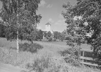 Kirka i landskapet. Foto fra 1948/49.
