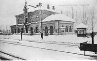 Postkort med vinterbilde av stasjonen fra begynnelsen av 1900-tallet.