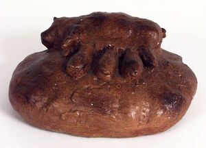 Julebrød fra Luster, dekorert med diende grisunger. Foto: Anne Lise Reinsfjell, Norsk folkemuseum