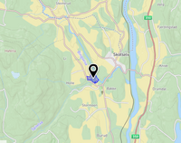 Kart som viser beliggenheten av eiendommen omtrent 1,5 kilometer sørvest for Skotselv