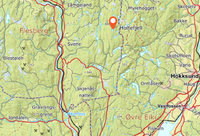 Kart som viser beliggenheten av Nørdre Øyvatnet, omtrent 7 km øst for Numedal og 1 km vest for kommunegrensa mot Øvre Eiker.