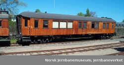 Kongevogn av eldre type, levert fra Strømmens Værksted.