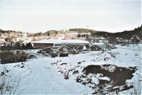 Mars 2002: Det er tidlig i utgravingen av tunnelen for E6 gjennom Eggevammen og anleggsveien er under bygging.