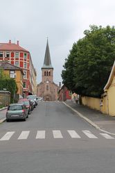Kirken sett fra Brinken gjennom Nannestadgata. Foto: Chris Nyborg (2013).