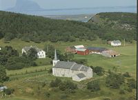 Dønnes kirke og Dønnes gård. Flyfoto fra 1964. Foto: K. Haugen