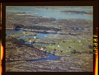 Flyfoto fra Kversøyna, 1961. Nasjonalbiblioteket/Widerøes Flyveselskap.