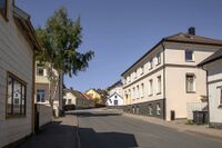 Parti fra Værlegata. Bebyggelsen bak den toetasjes murbygningen til høyre ligger nord for Nyquists gate og ble dermed bevart. Foto: Leif-Harald Ruud (2014)