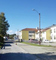 Den nedre delen av Nyvegen, Folkets Hus til høgre. Foto: Trond Nygård (2014).