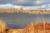 Glomma ved Hennisand med Opaker i bakgrunnen. Foto: Leif-Harald Ruud (2021)