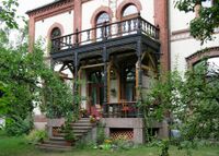 Biermanns gate 6, fasade med veranda ut mot hagen. Foto: Roy Olsen (2004).