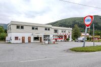 Forretningsgård i grenda Mittet lengst nordøst i Rauma kommune. Foto: Leif-Harald Ruud (2021).