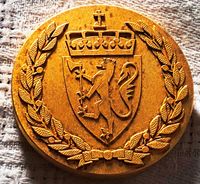 Regjeringens minnemedalje 2015, revers.