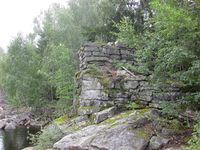 Skreosbrua. Eine brufestet på Kviteseidsida. (Foto: Olav Momrak-Haugan, 2010)