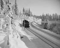 Holmenkollbanen en vinterdag mellom Lillevann og Frognerseteren. Foto: Nasjonalbiblioteket (1952-1953).