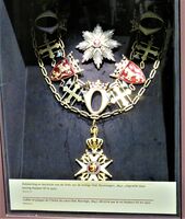 Storkorset av St. Olavs Orden gitt av kong Haakon VII til kong Albert I av Belgia i 1910 slik det er utstilt på militærmuseet i Brussel. Foto: Stig Rune Pedersen (2024)