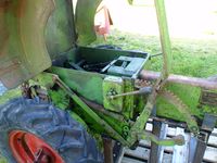 Høgdespak for reiskapsløft, høgre spak for styrebrems og hjulutkobling