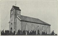 Tjøtta kirke, steinkirke fra 1851. Foto: Nasjonalbiblioteket (1920).